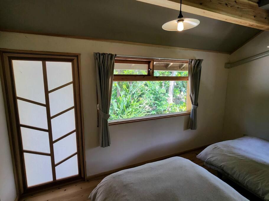 琉球古民家 蒼 Appartement Motobu Buitenkant foto