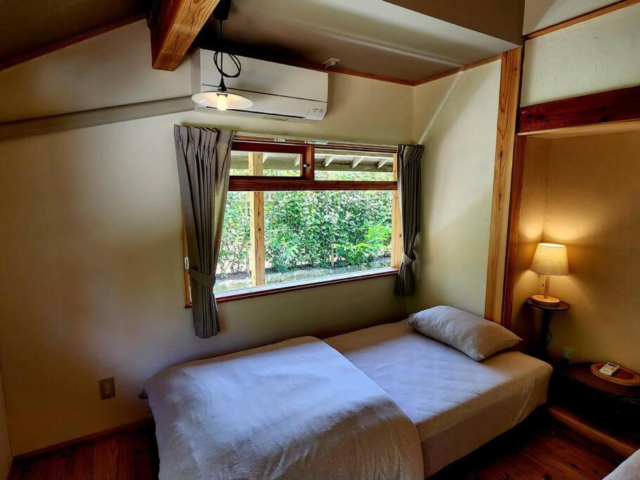 琉球古民家 蒼 Appartement Motobu Buitenkant foto