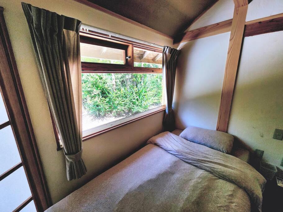 琉球古民家 蒼 Appartement Motobu Buitenkant foto