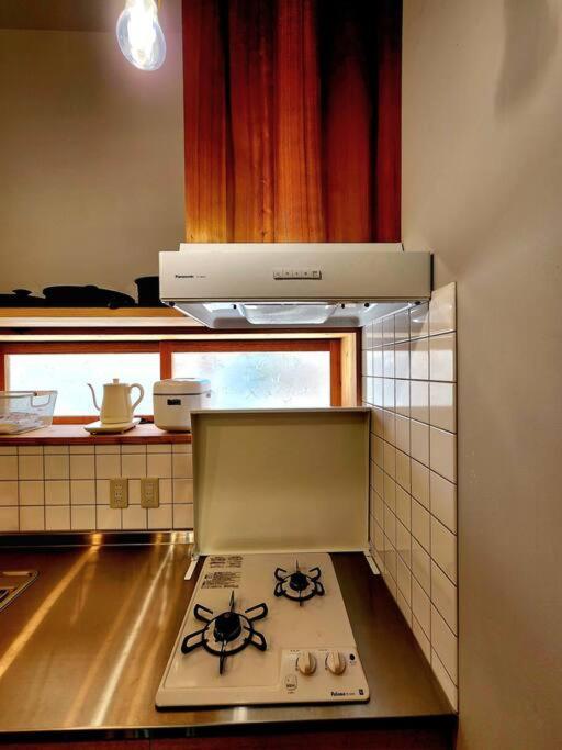 琉球古民家 蒼 Appartement Motobu Buitenkant foto
