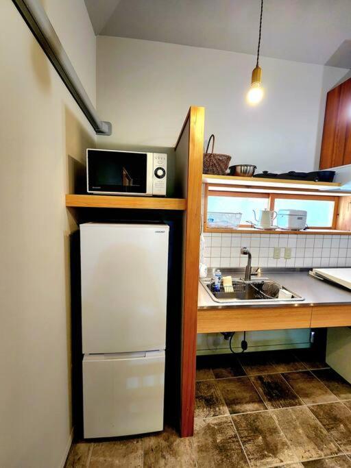 琉球古民家 蒼 Appartement Motobu Buitenkant foto