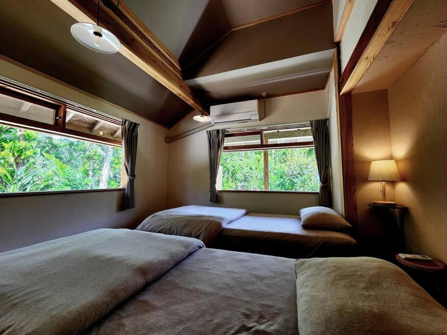 琉球古民家 蒼 Appartement Motobu Buitenkant foto