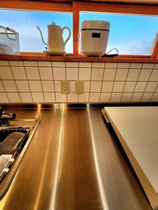 琉球古民家 蒼 Appartement Motobu Buitenkant foto