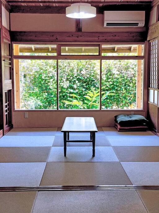 琉球古民家 蒼 Appartement Motobu Buitenkant foto