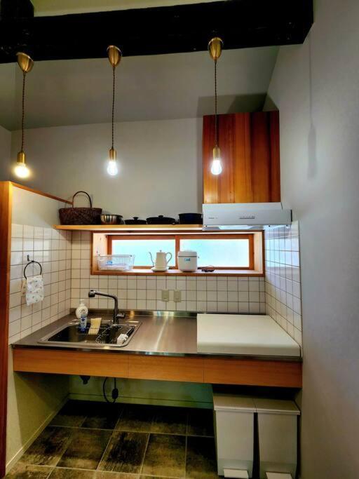 琉球古民家 蒼 Appartement Motobu Buitenkant foto