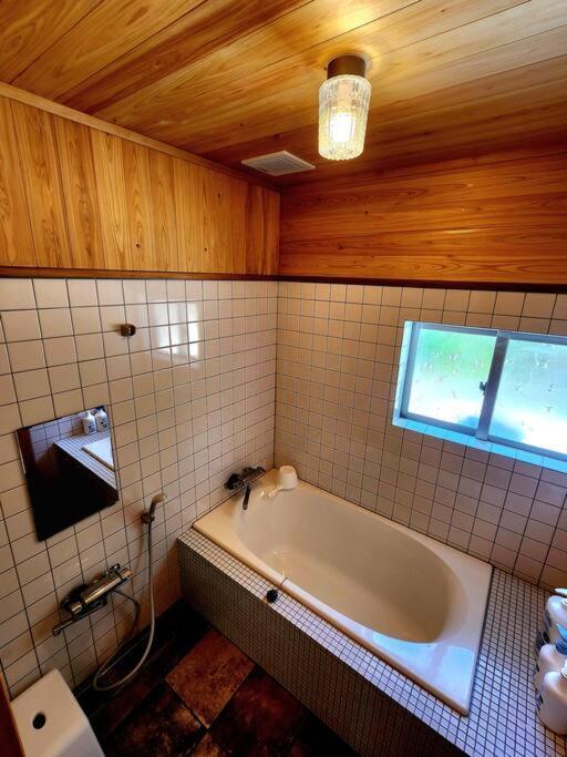 琉球古民家 蒼 Appartement Motobu Buitenkant foto