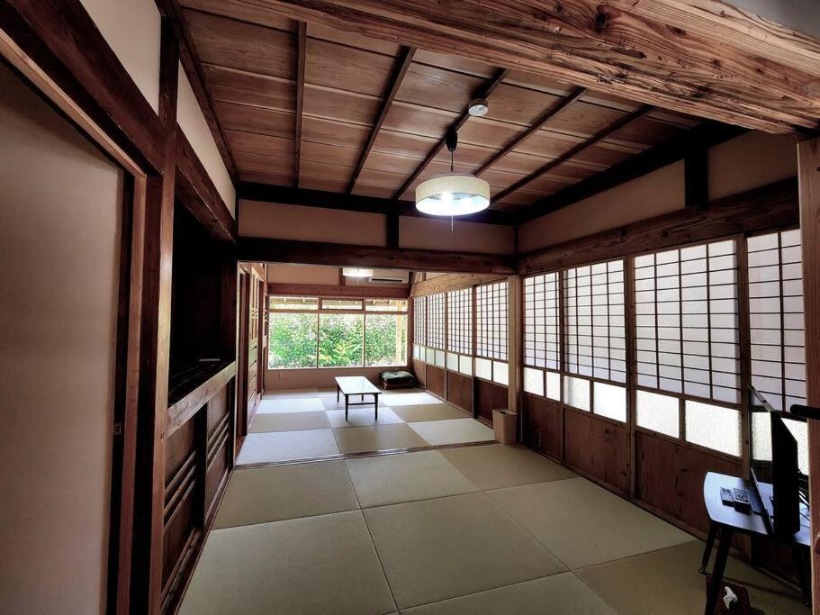 琉球古民家 蒼 Appartement Motobu Buitenkant foto