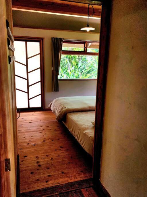 琉球古民家 蒼 Appartement Motobu Buitenkant foto