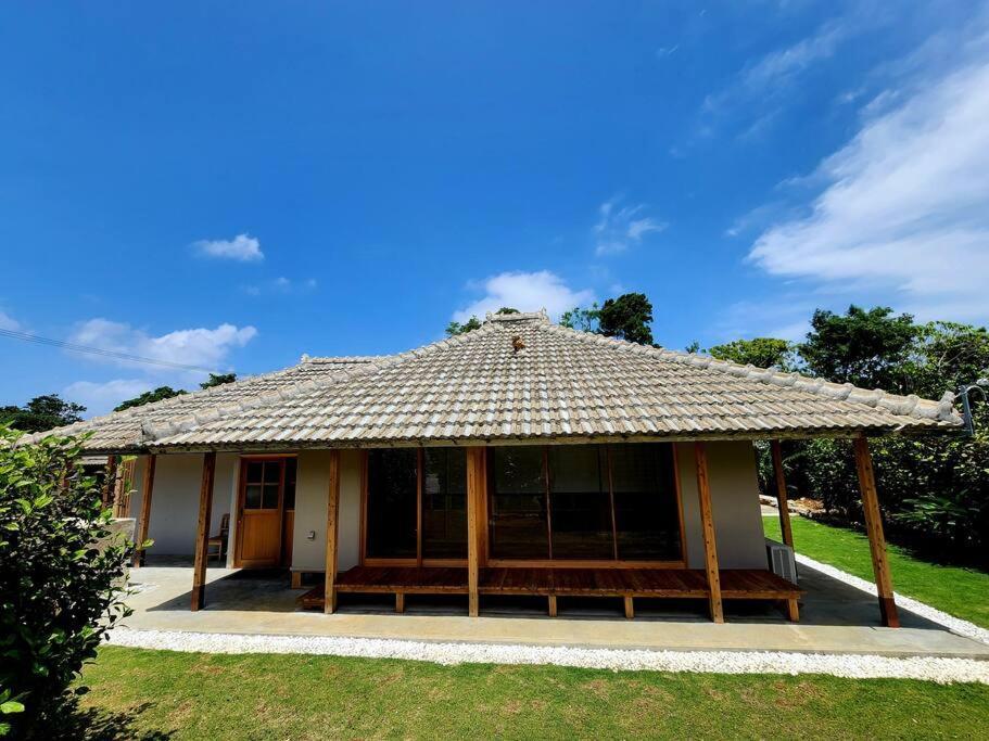 琉球古民家 蒼 Appartement Motobu Buitenkant foto