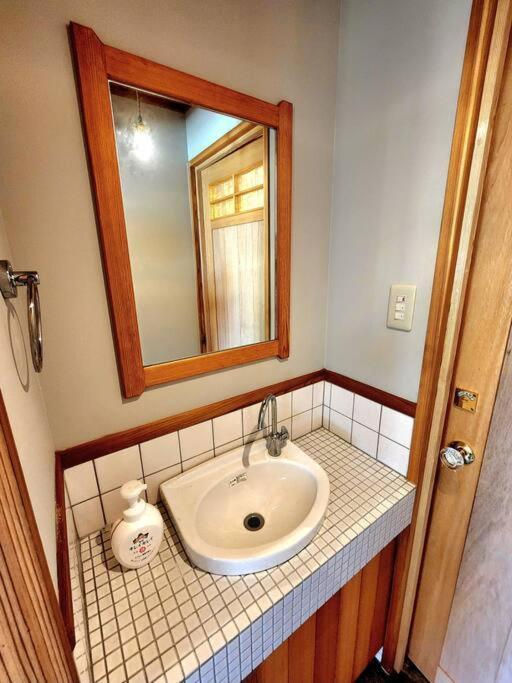 琉球古民家 蒼 Appartement Motobu Buitenkant foto