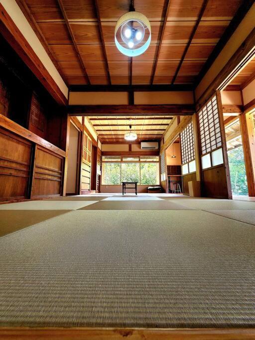 琉球古民家 蒼 Appartement Motobu Buitenkant foto