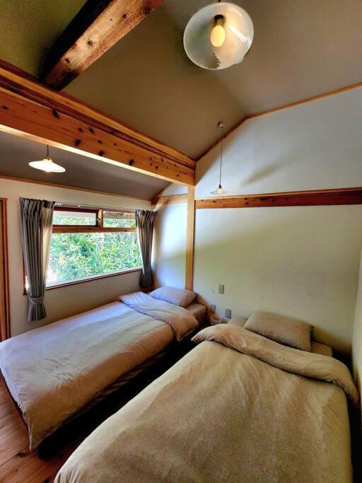 琉球古民家 蒼 Appartement Motobu Buitenkant foto