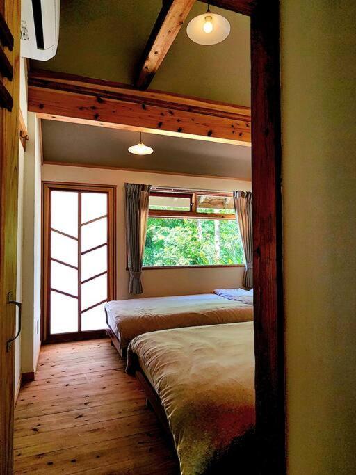 琉球古民家 蒼 Appartement Motobu Buitenkant foto