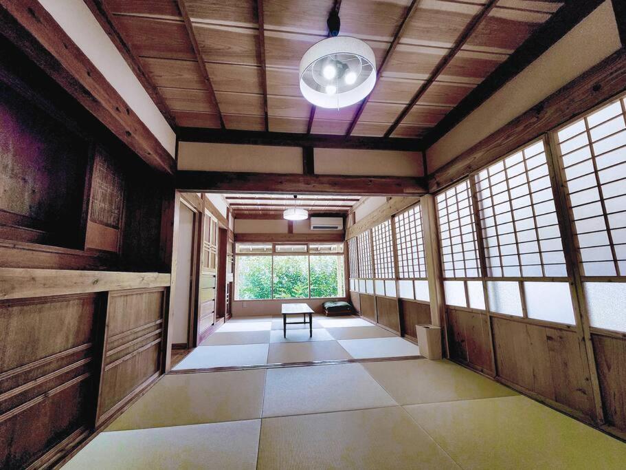 琉球古民家 蒼 Appartement Motobu Buitenkant foto